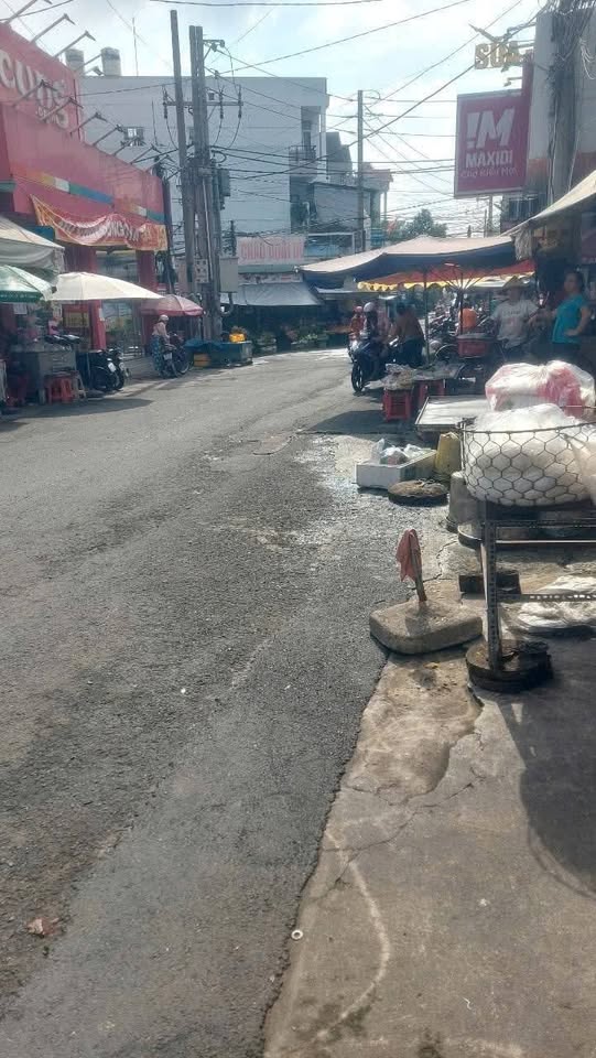 Nhà cấp 4 mặt tiền Chợ Trại Bò, Long Bình - Sổ riêng 3.55 tỷ