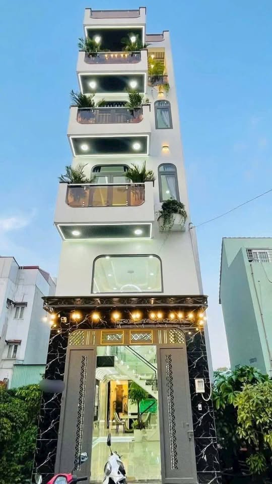 Nhà 7 tỷ 4 phòng ngủ, gara ô tô, tầng lửng, hướng Nam, Hóc Môn