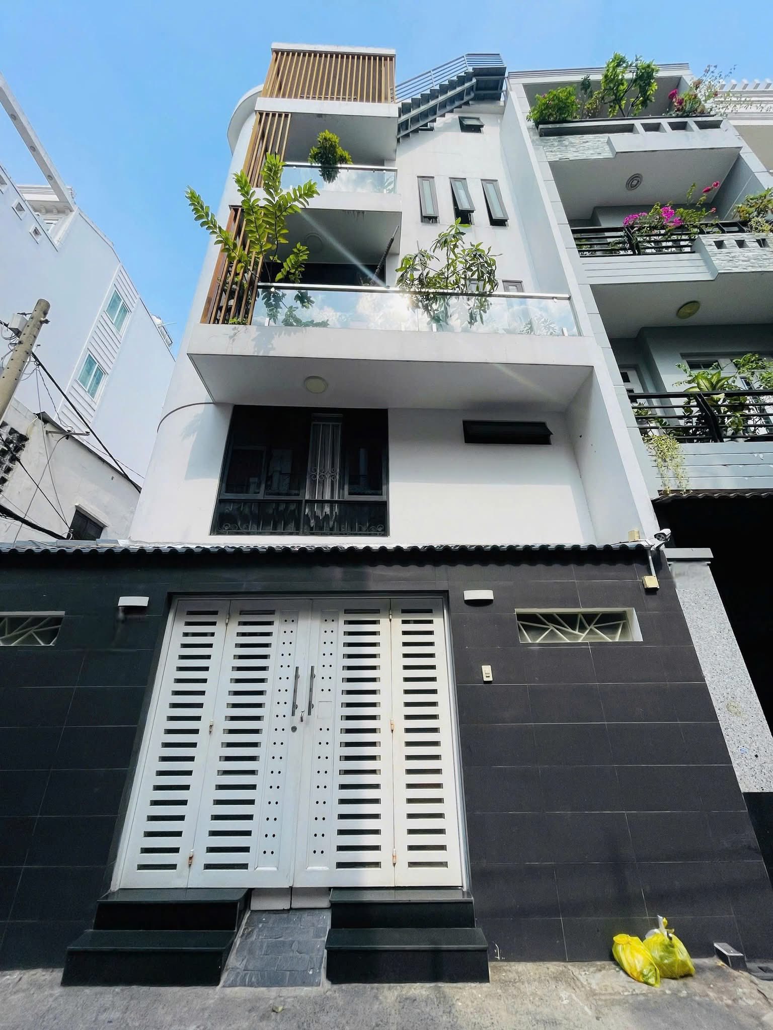 Biệt thự 4 tầng 6m x 15m, sát Quận 3 full nội thất, 10,8 tỷ