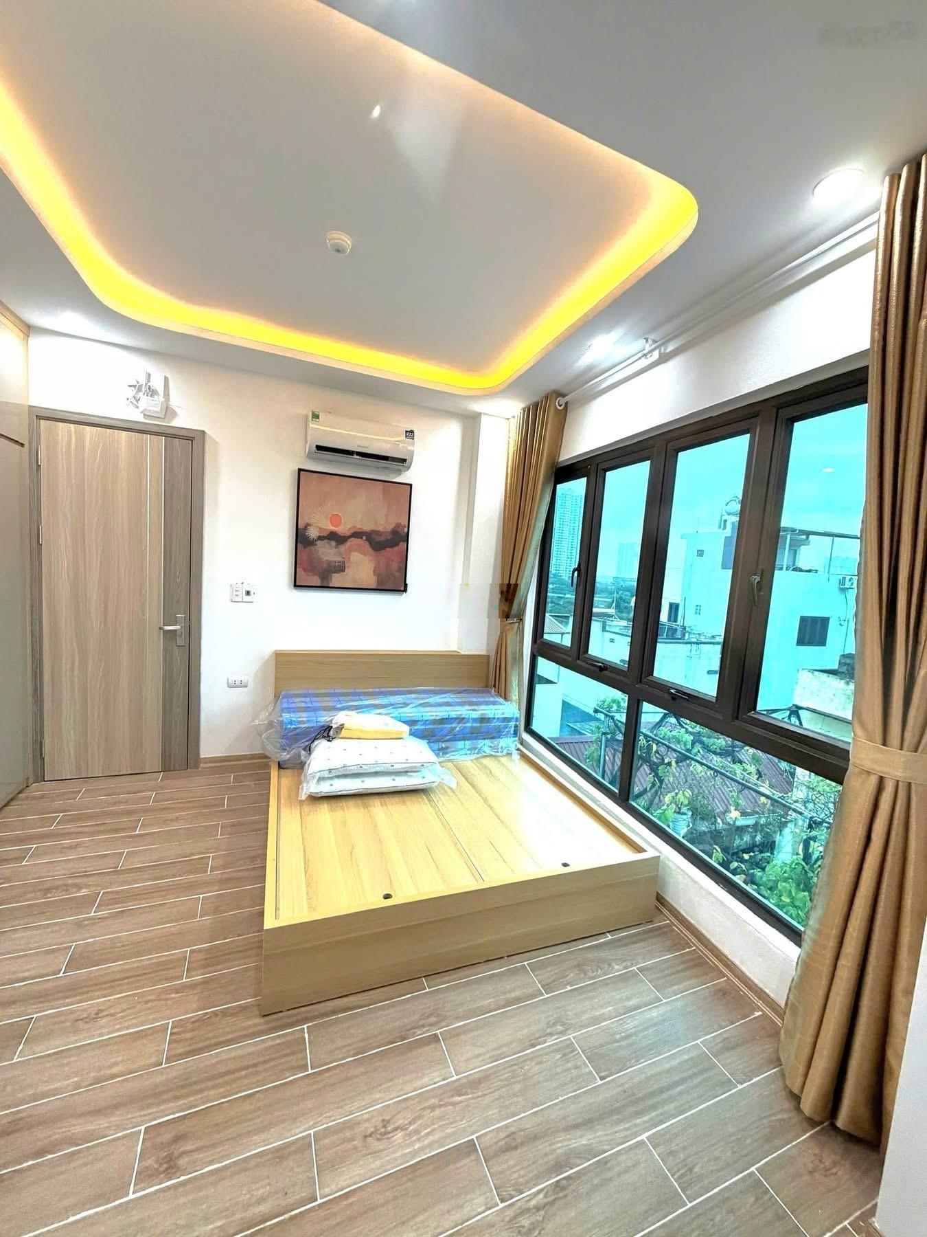 Toà CCMN Hoàng Hoa Thám, Ba Đình 70m x 6T, lô góc 2 thoáng, 10 căn hộ KK, DT 65 triệu/tháng