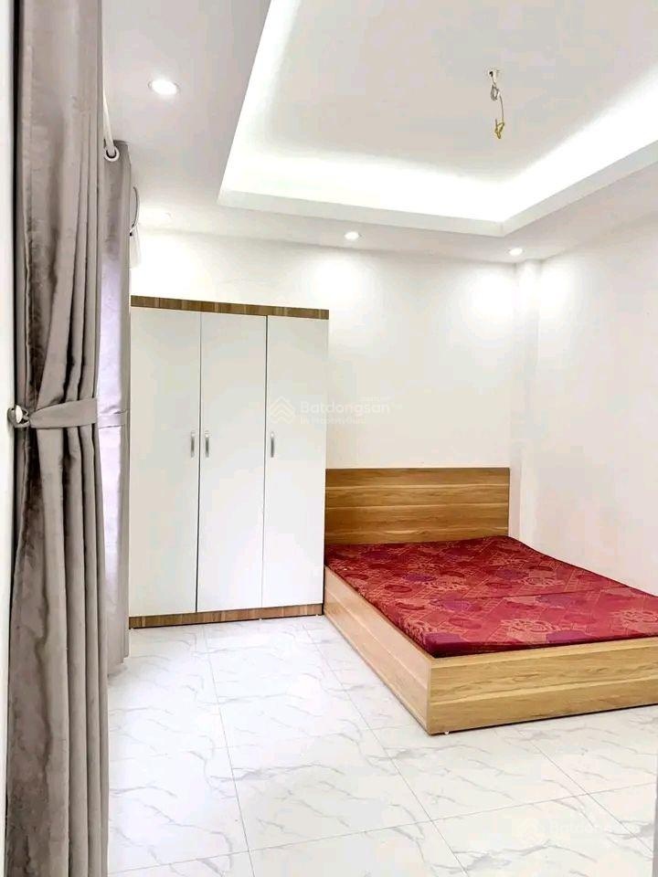 Bán nhà 82 kim mã, 11 phòng thiết kế căn hộ cho thuê đạt 55 triệu/tháng, 7 tầng thang máy, 11,9 tỷ.