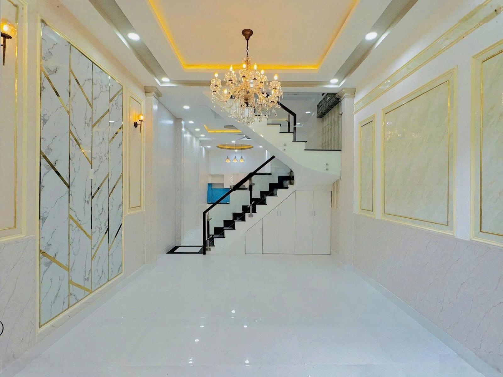 Nhà mới sửa cần bán gấp tại hẻm 134 Hàn Hải Nguyên, P. 9, Q. 11, (52m2),chỉ 2tỷ970,hẻm ô tô, sổ sẵn