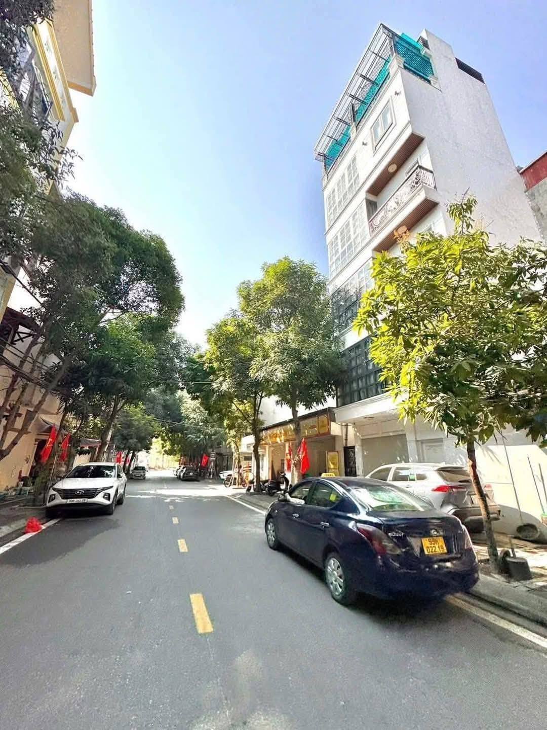 Bán toàn nhà phân lô phố Tam Trinh, 90m2 × 7 tầng, thang máy, sổ đỏ vuông A4.