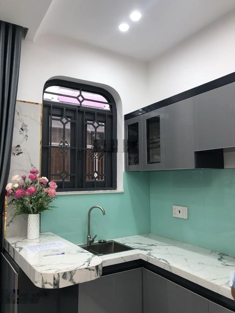 Gò Vấp Bán nhà 1 trệt 1 lầu, diện tích sàn: 45m2, 6 phòng, hẻm rộng, gần E mart