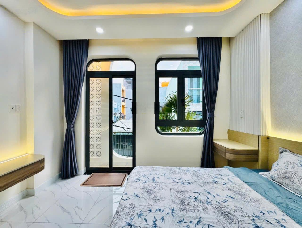 Nhà Đẹp Căn Góc Nguyễn Văn Khối P8__Diện tích: 4.05m x 10m: 1 trệt 1 lầu.2 phòng ngủ, 2 toilet.