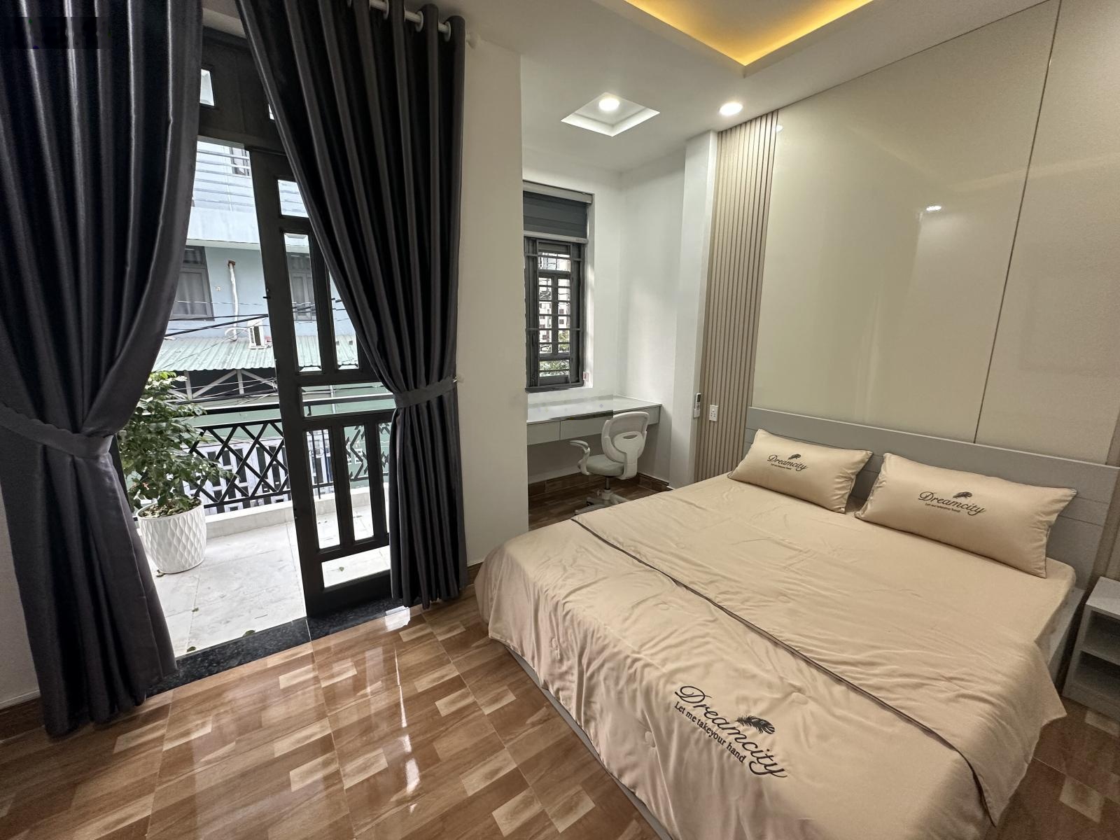 Bán gấp - nhà đẹp mới - 2 tầng - kề bên chợ cầu quang trung - gần siêu thị emart - ngang 4m- ở ngay