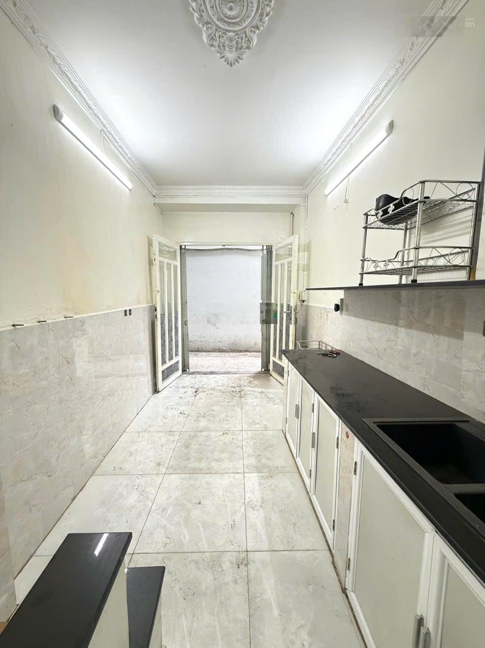 Bán nhà 2 lầu sổ hồng riêng - quận 7